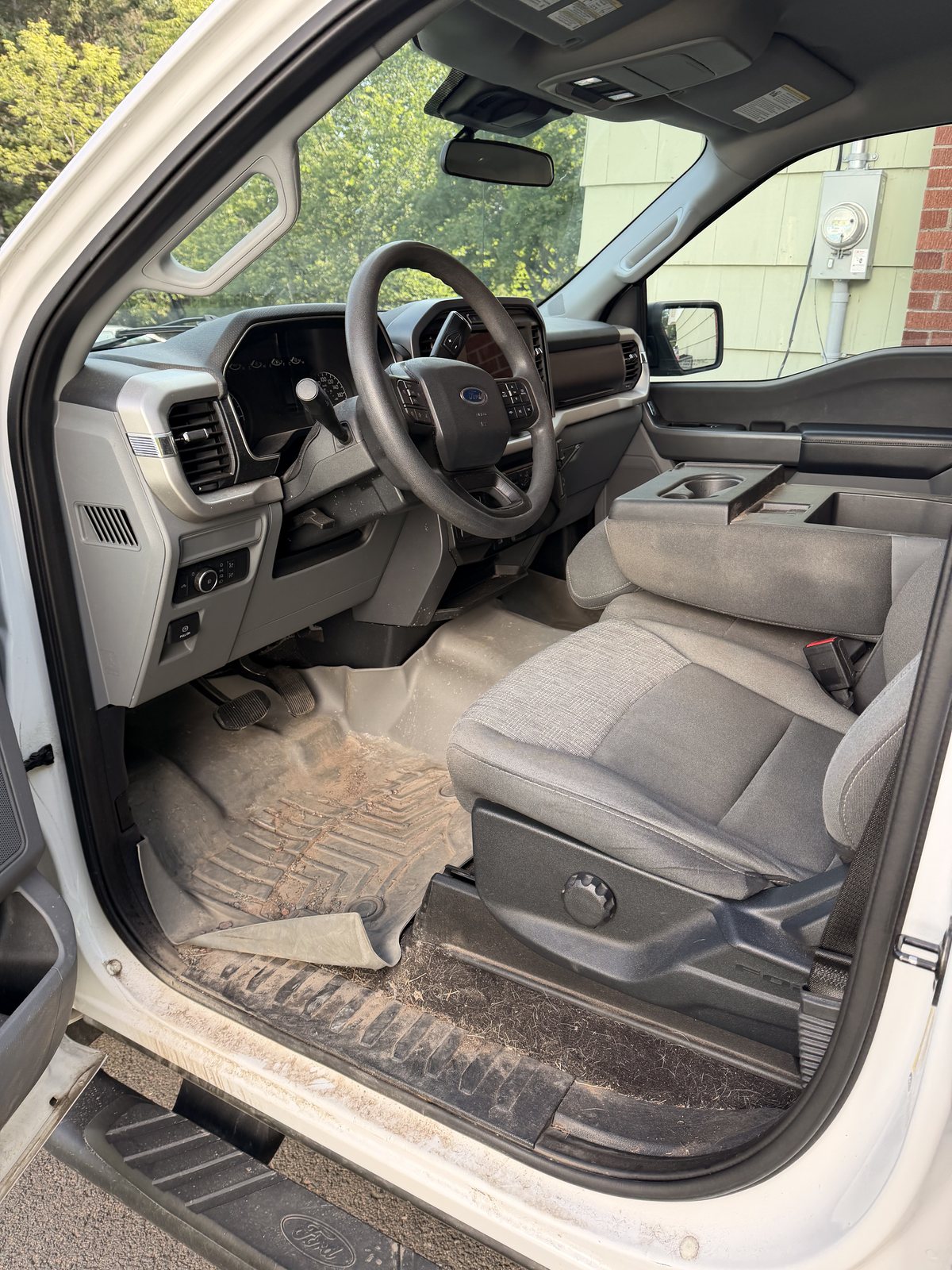 Ford F-150 driver footwell before detail